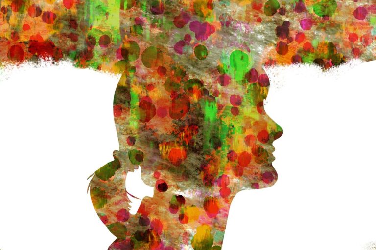 Kolorowy profil kobiety utworzony z wielobarwnych plam ilustruje zjawisko znane jako katastrofizacja.